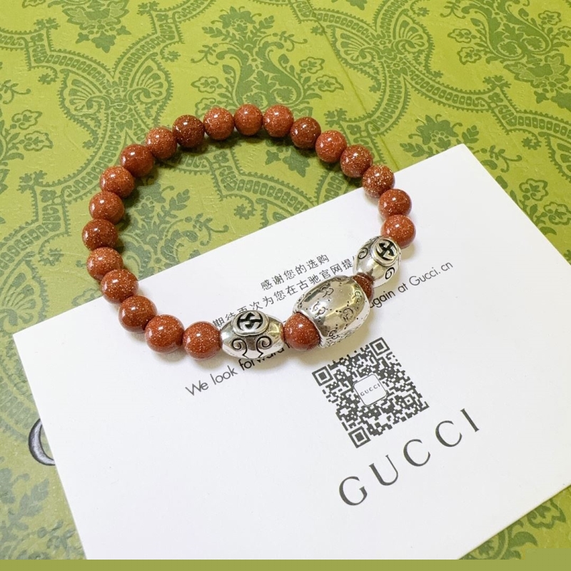 G*u*i bracelets